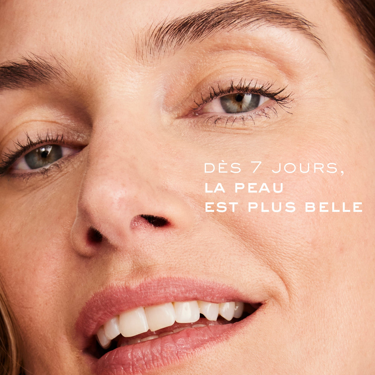 NUXE Nuxuriance Ultra, close-up of a smiling woman's face, text in French