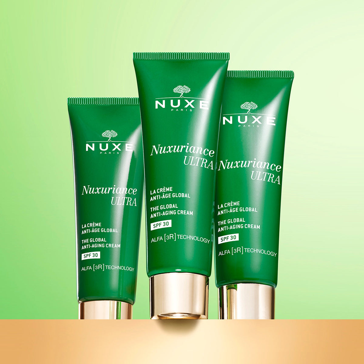 NUXE Nuxuriance Ultra, three tubes on a green and gold background