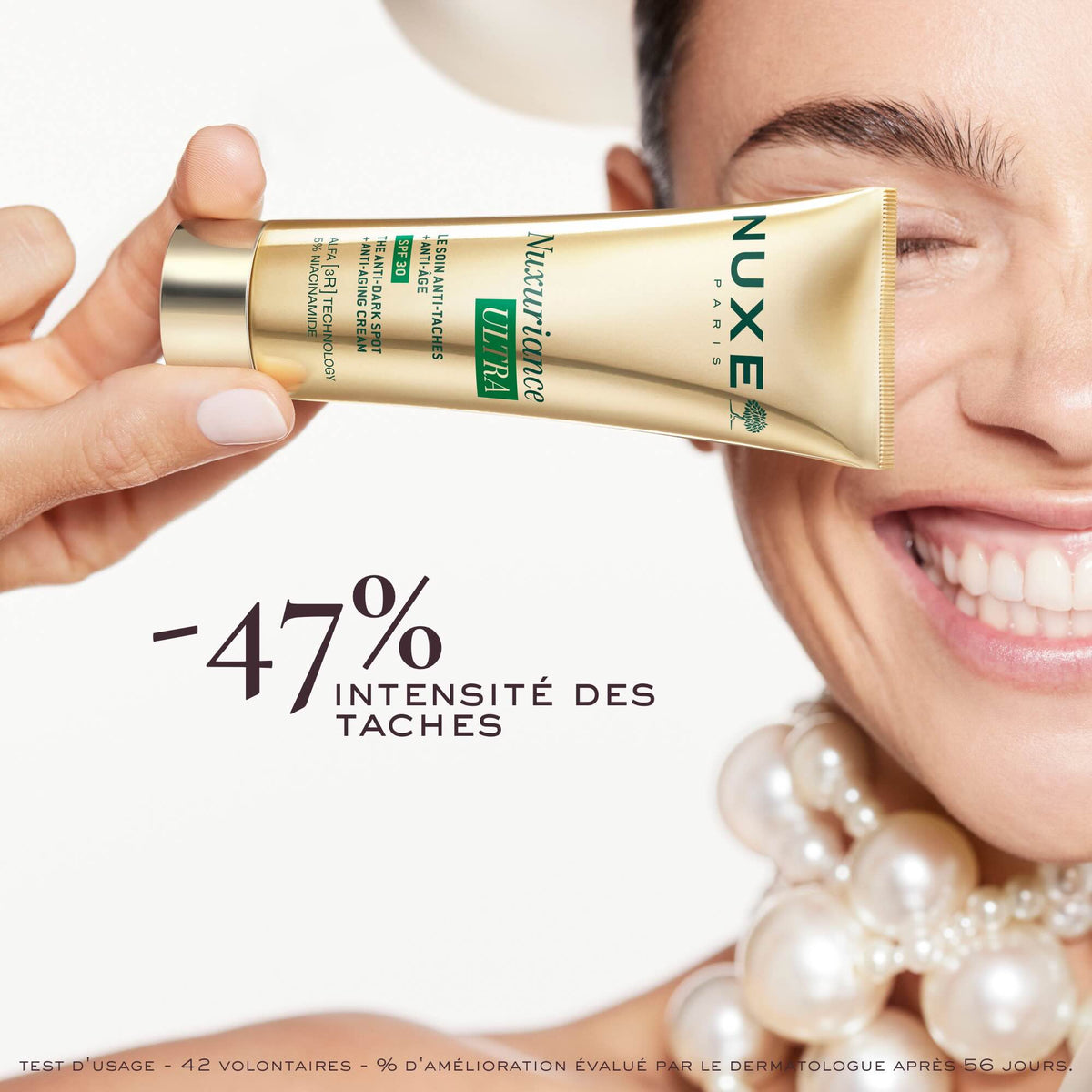 NUXE Nuxuriance Ultra, smiling woman holding the tube, study results in French