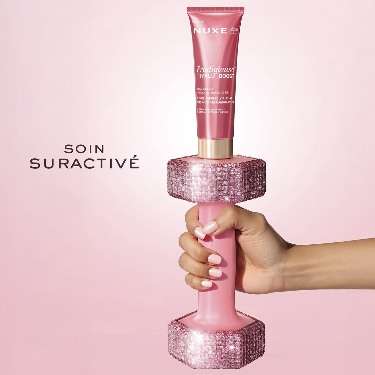 NUXE Prodigieuse Hyalu Boost, tube on a sparkly pink dumbbell, text in French