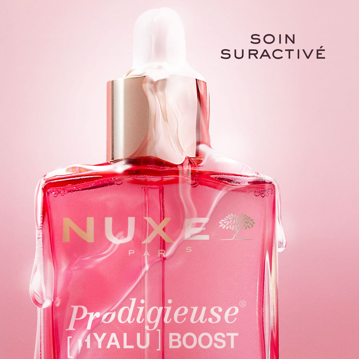 NUXE Prodigieuse Hyalu Boost, close-up of the dropper bottle with serum drips, text in French