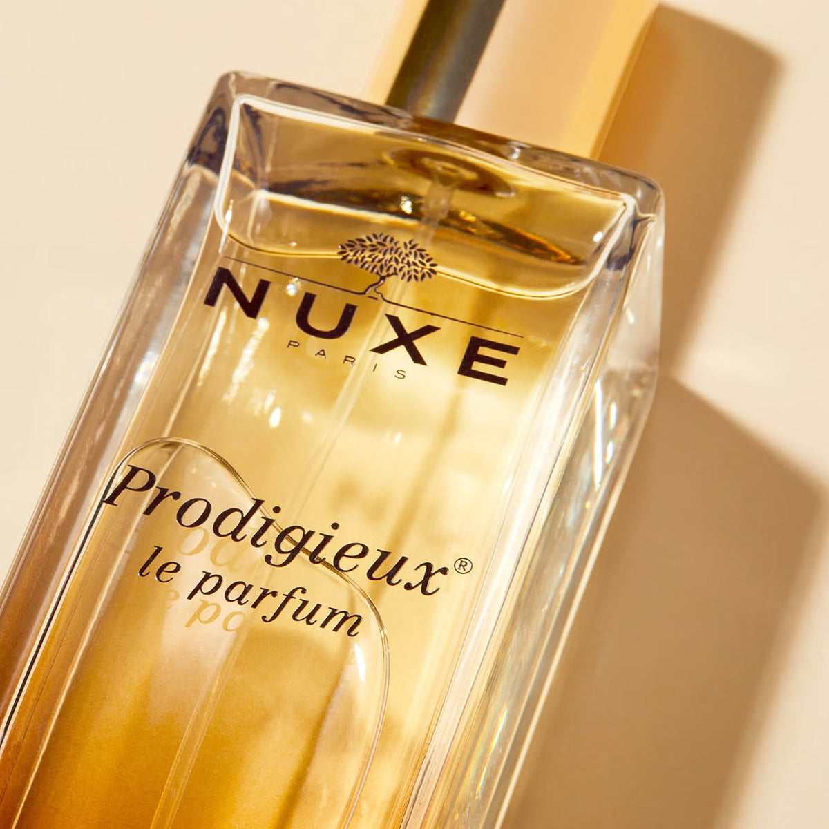NUXE Prodigieux, close-up of the glass bottle lying at an angle