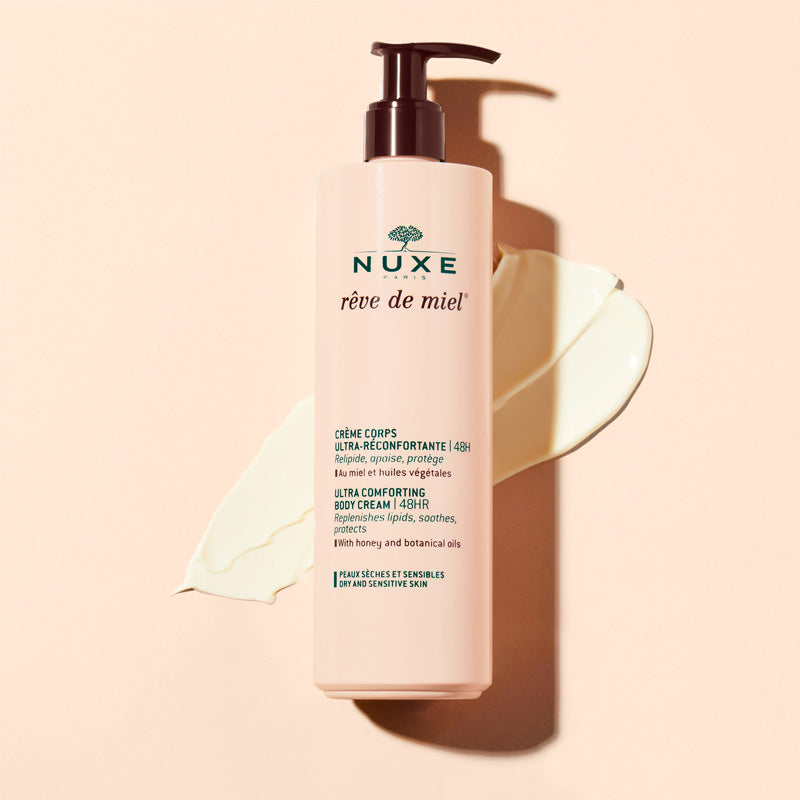 NUXE Rêve de Miel, pump bottle and cream swatch on a pink background