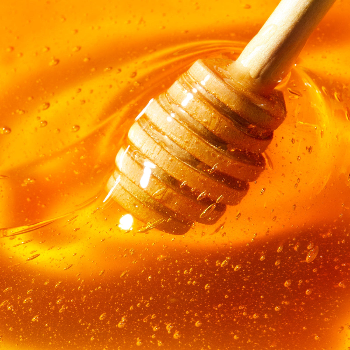 NUXE Rêve de Miel, wooden dipper in golden honey