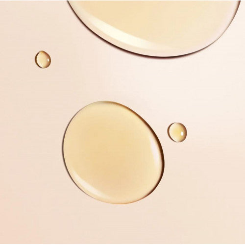 NUXE Honey Lip Care balm pot with honey and botanical extracts, product close-up