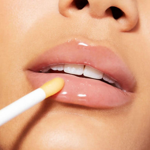 NUXE Honey Lip Care balm pot with honey and botanical extracts, side view