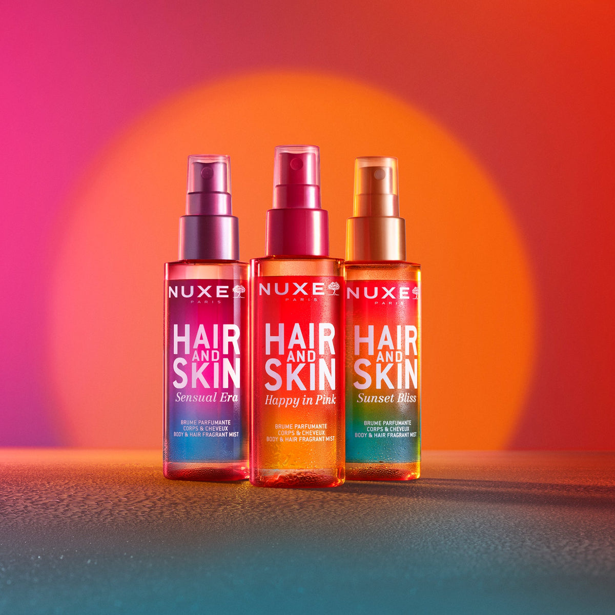NUXE Hair and Skin Sensual Era, range of three mists with Happy in Pink and Sunset Bliss