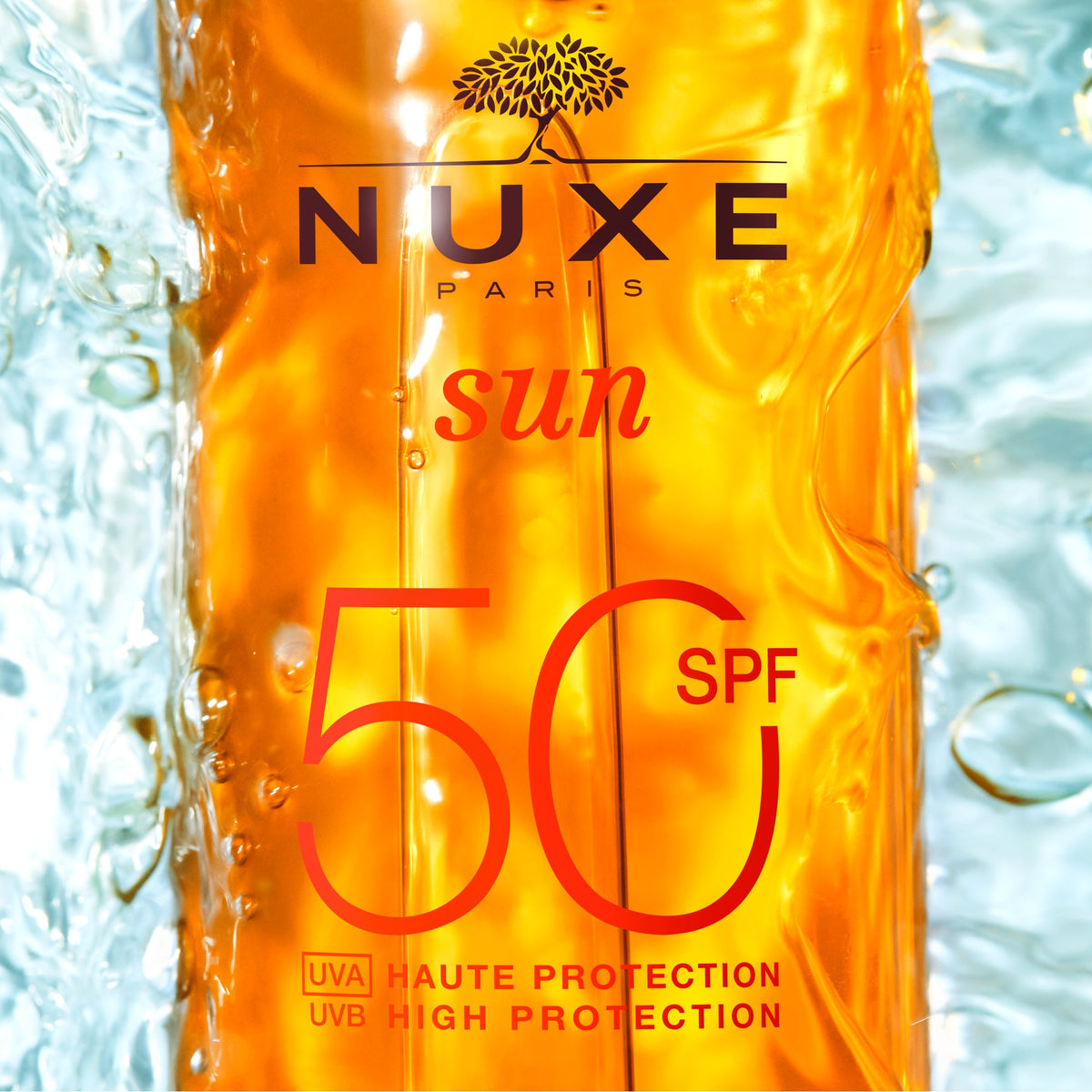 NUXE SUN, close-up of the bottle label in water