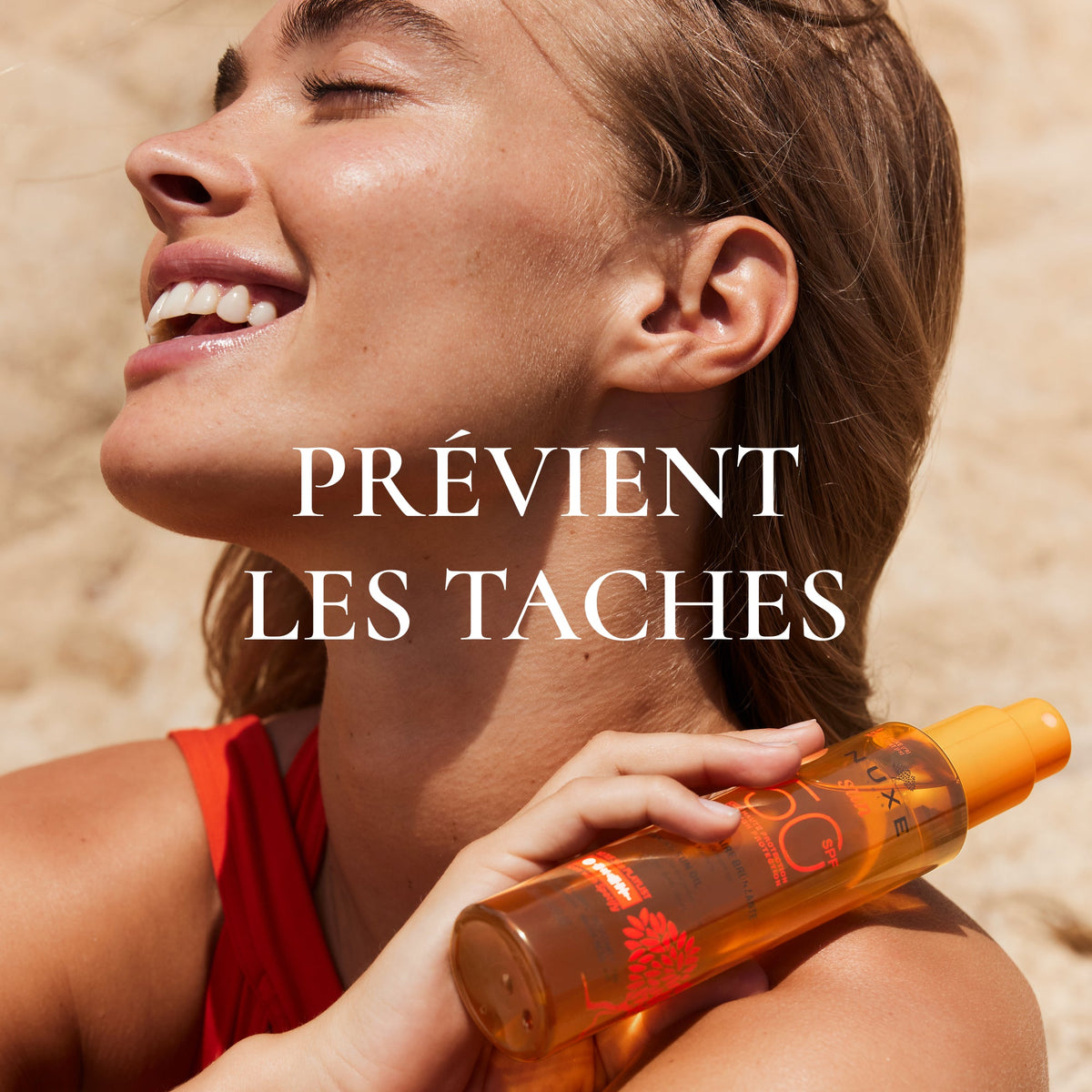 NUXE SUN, smiling woman holding the bottle on her shoulder, text in French