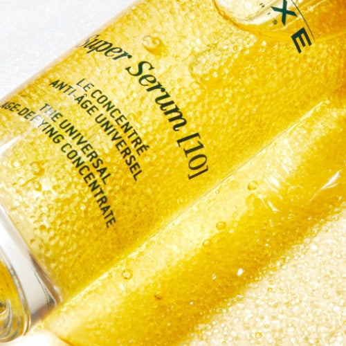NUXE Super Serum [10], close-up of the glass bottle label