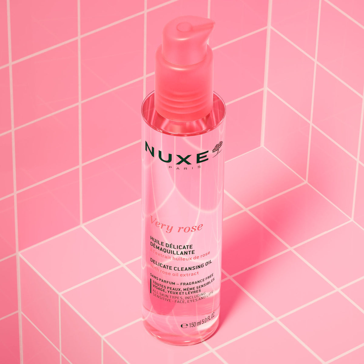 NUXE Very Rose, pump bottle standing on pink tiles