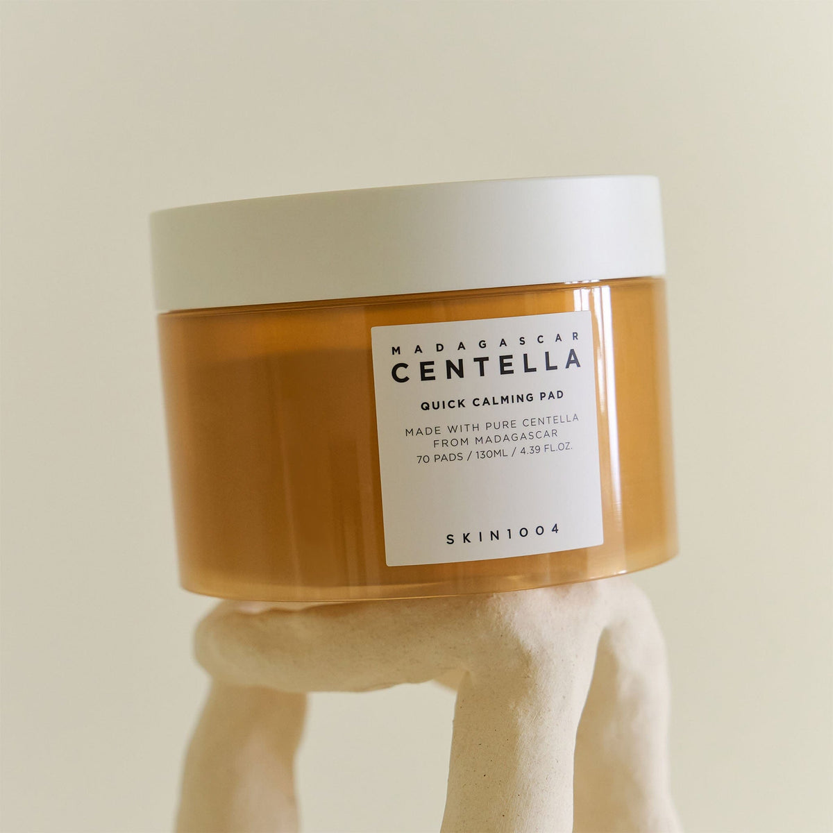 SKIN1004 Madagascar Centella, jar resting on a clay stand