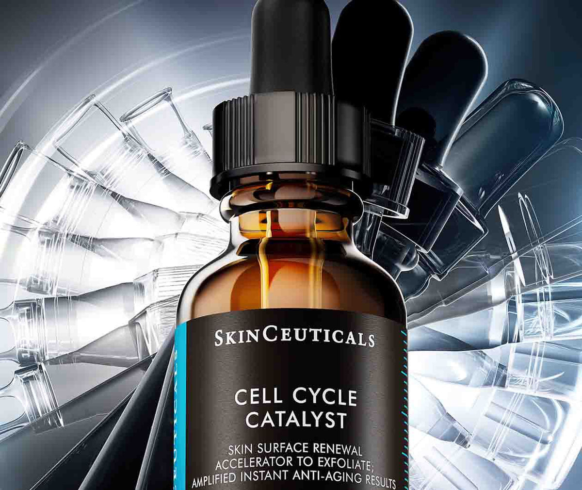 SkinCeuticals Cell Cycle Catalyst, close-up of the glass bottle before a fan of glass droppers