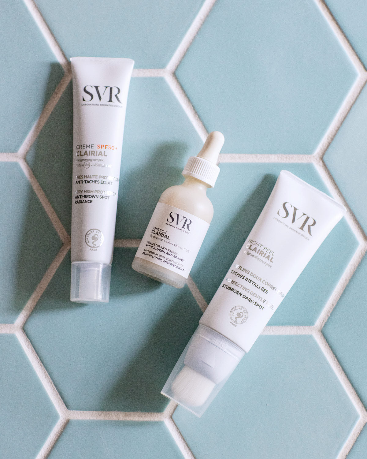 SVR Clairial, three products from the range on blue hexagonal tiles