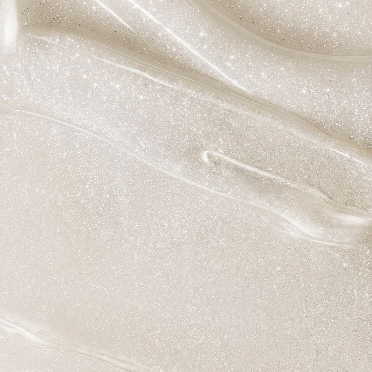 Topicrem Ultra Hydratant, milk texture swatch with shimmer