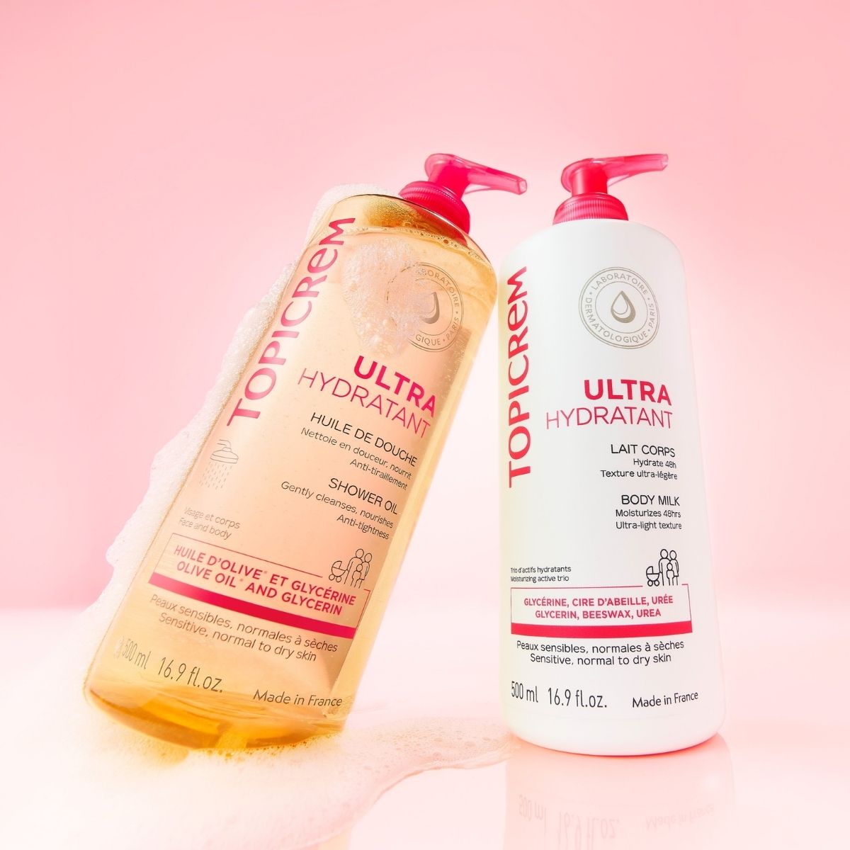 Topicrem Ultra Hydrating, shower oil and body milk pump bottles side by side
