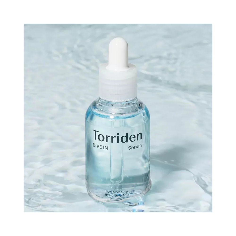 Torriden Dive-In, bottle standing in rippling water