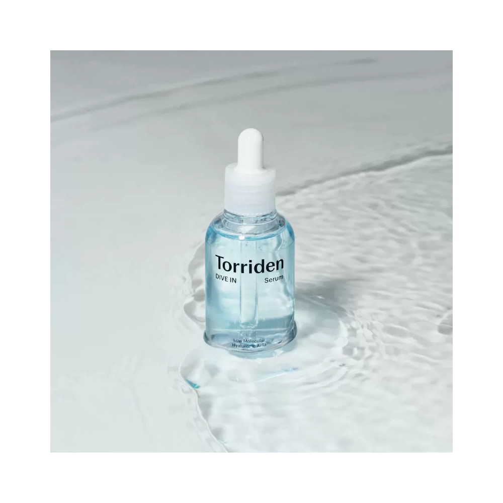 Torriden Dive-In, bottle in a shallow pool of water
