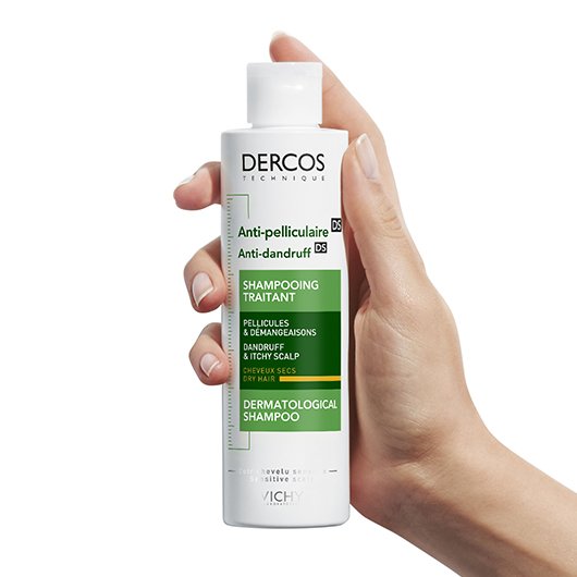 Vichy Dercos DS, hand holding the bottle