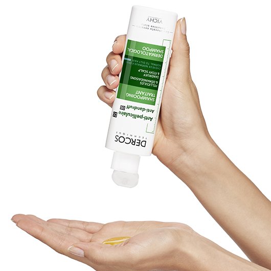 Vichy Dercos DS, shampoo poured from the bottle into a palm