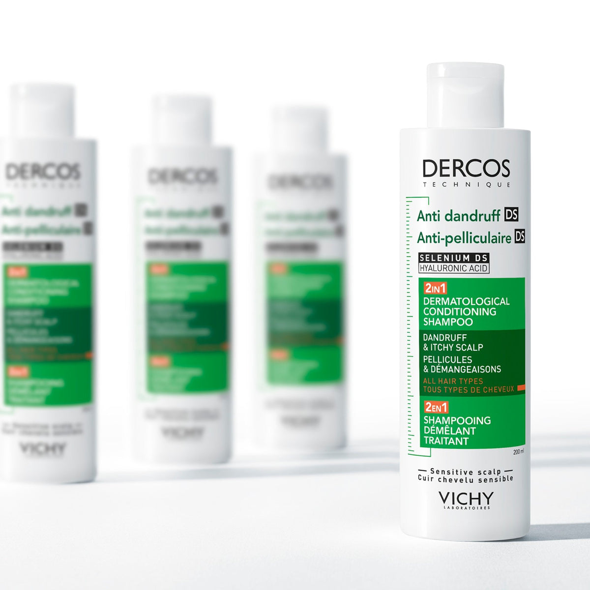 Vichy Dercos DS, bottle in front of three blurred bottles