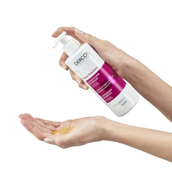 Vichy Dercos Densi-Solutions, shampoo poured from the pump bottle into a palm