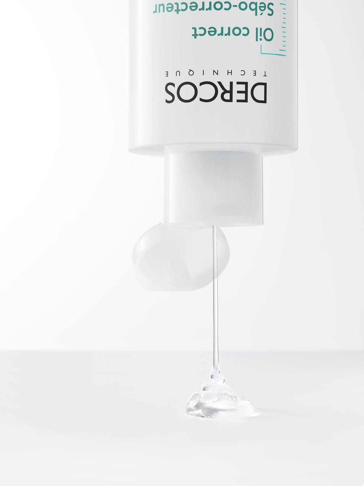 Vichy Dercos Sébo-Correcteur, clear gel dripping from the bottle