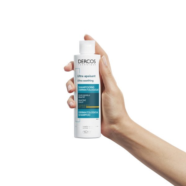 Vichy Dercos Ultra-Apaisant, hand holding the bottle