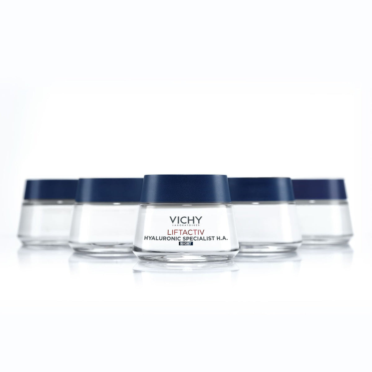 Vichy Liftactiv, row of five jars with navy lids on a white background