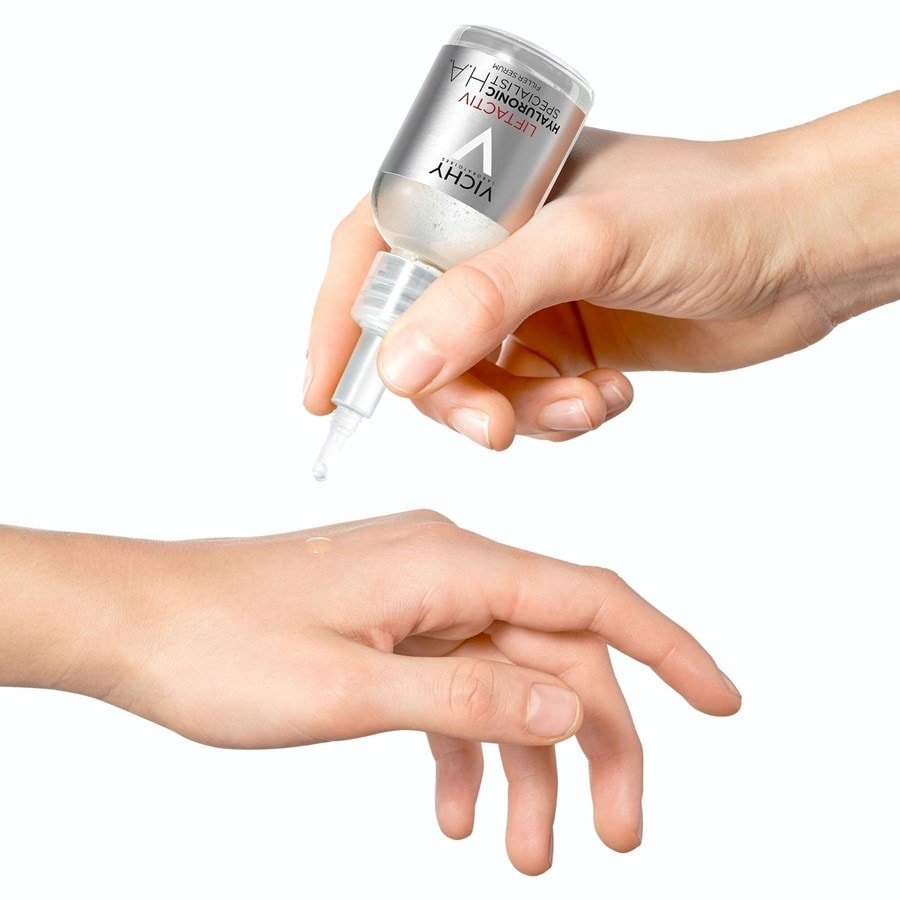 Vichy Liftactiv H.A., drop of serum dispensed onto the back of a hand