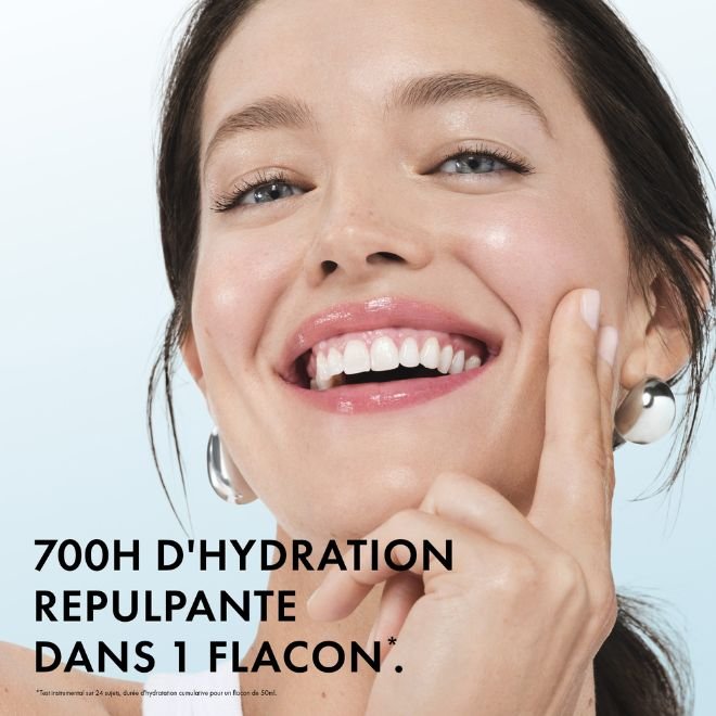 Vichy Mineral 89, smiling woman touching her cheek, text in French