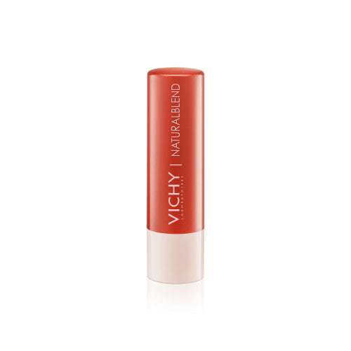 Vichy NaturalBlend Tinted Lip Care Coral 4.5g balm tube on white background, alternate angle
