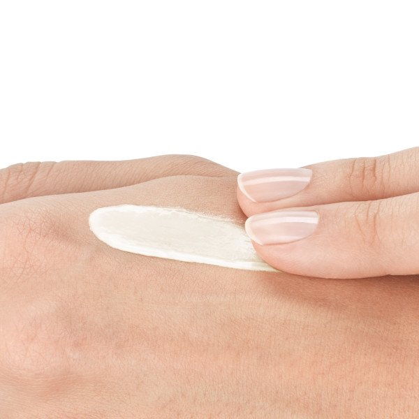 Vichy Normaderm, white paste swatch on the back of a hand