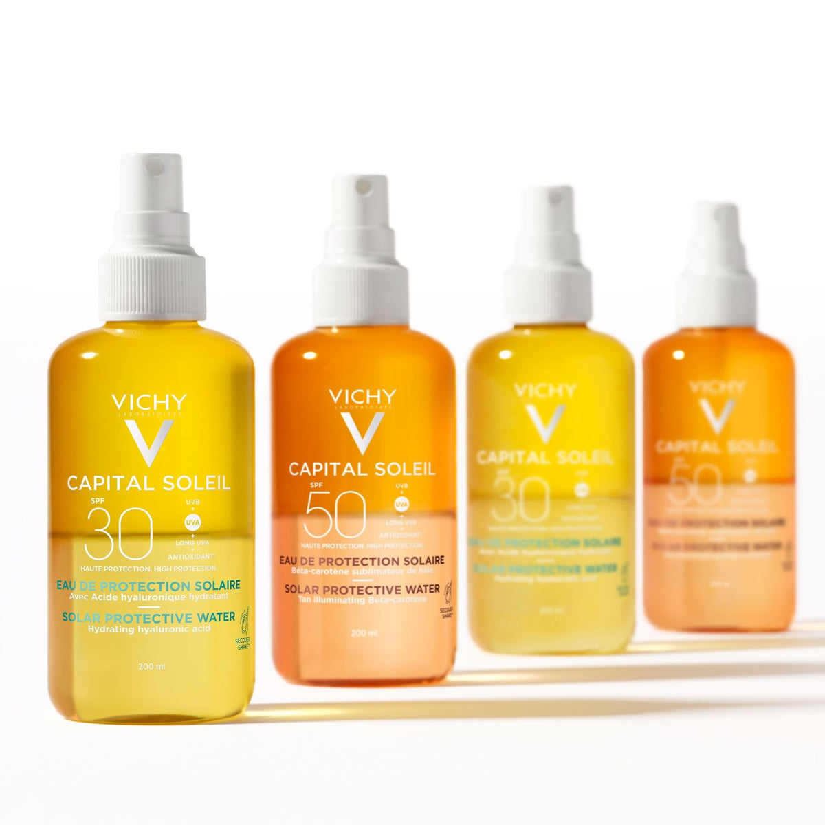 Vichy Capital Soleil, four spray bottles of solar protective water in a row