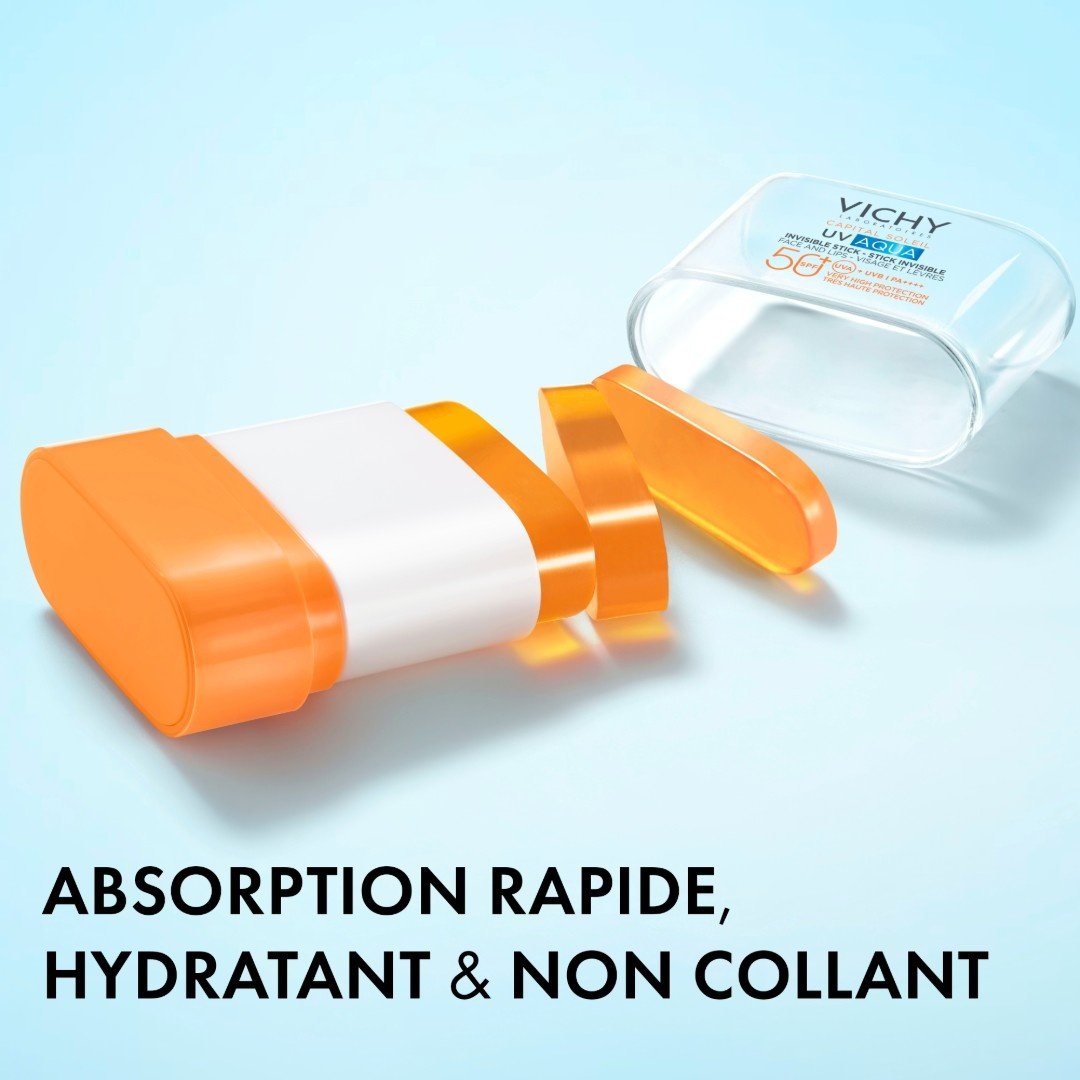 Vichy UV Aqua, open stick lying beside its cap with text in French